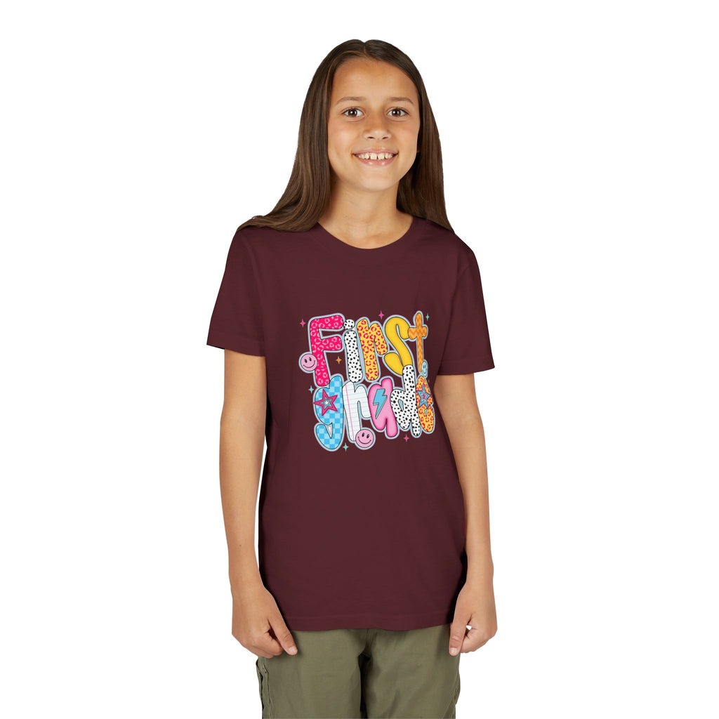 First Grade Youth Tee — Colorful Back-to-School Graphic Shirt