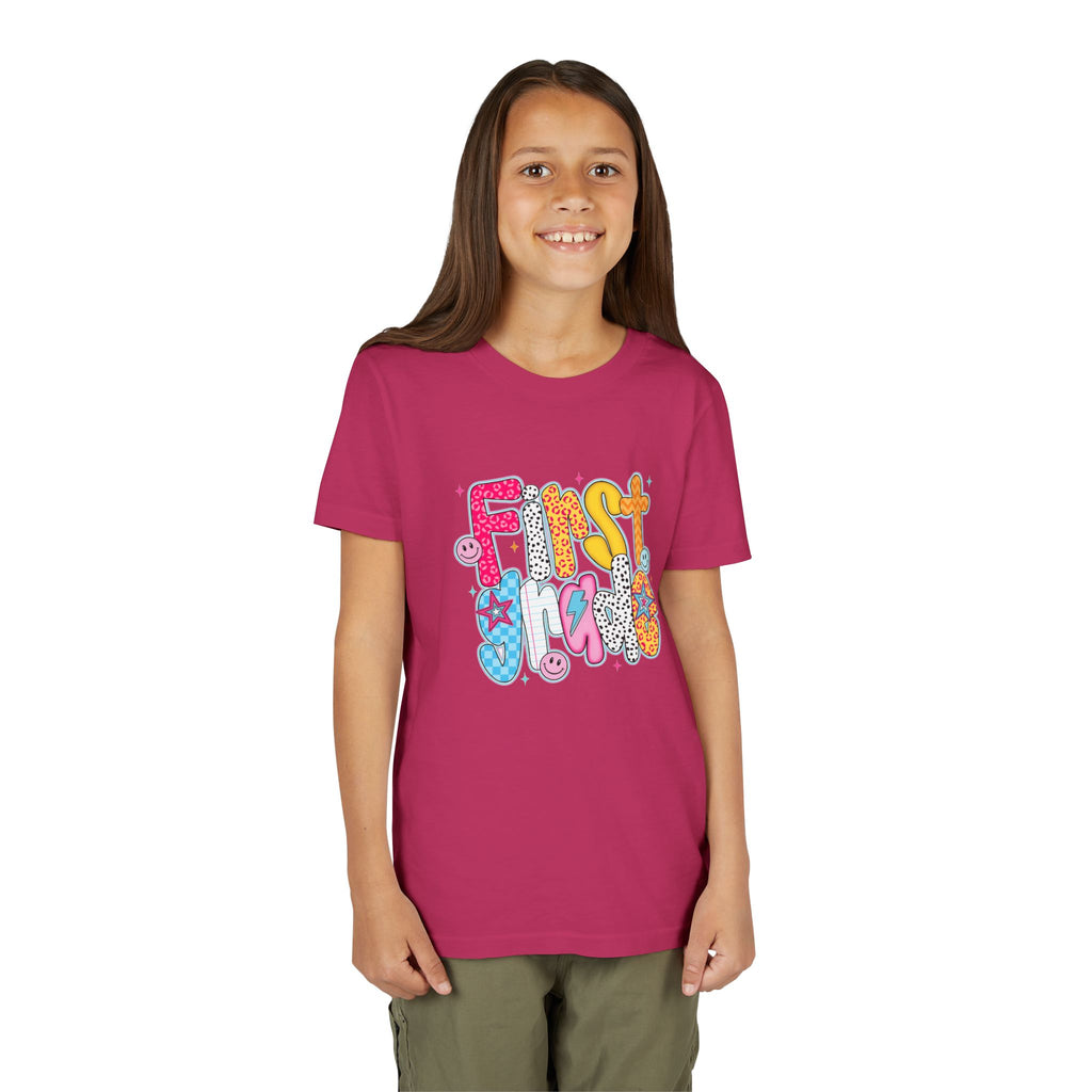 First Grade Youth Tee — Colorful Back-to-School Graphic Shirt