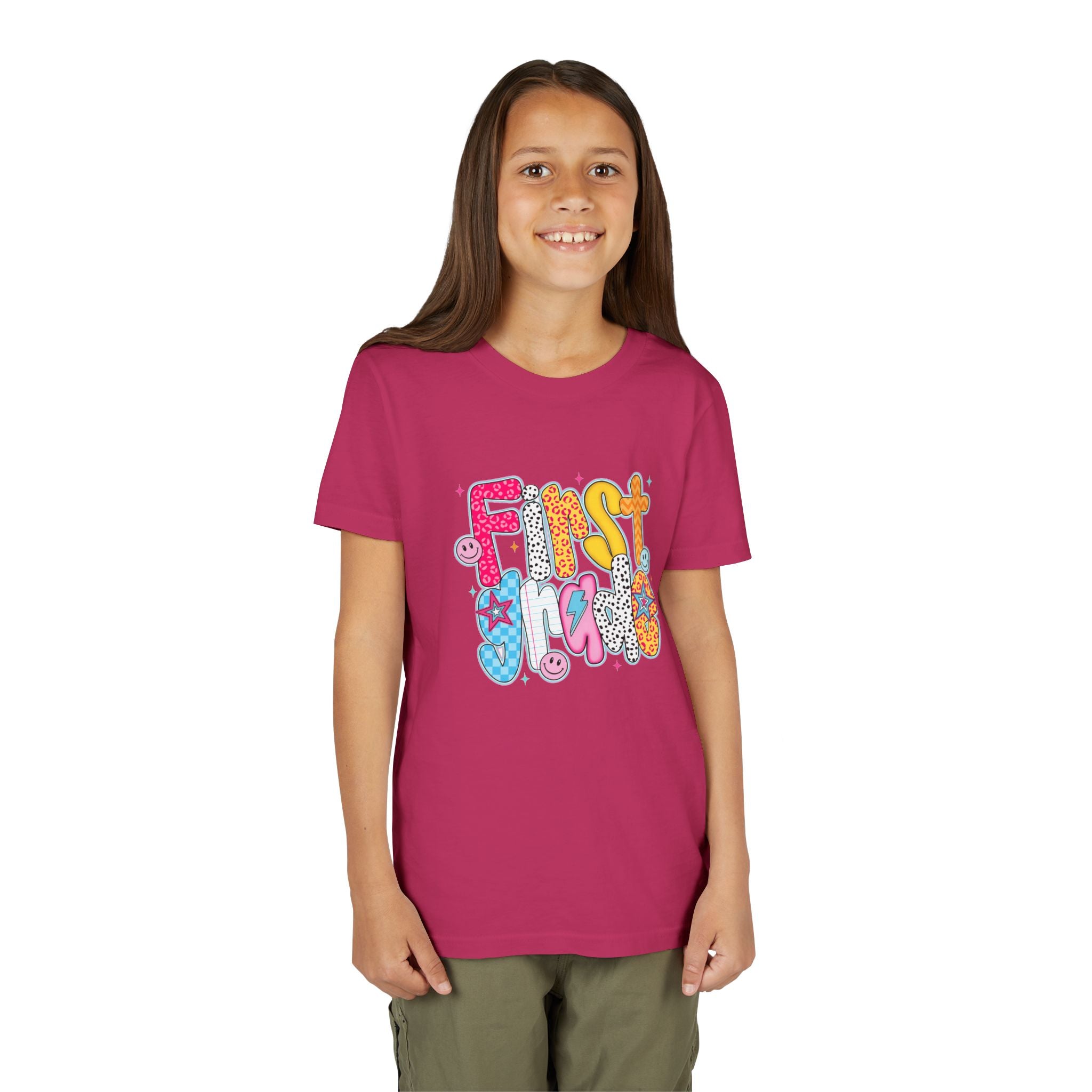 First Grade Youth Tee — Colorful Back-to-School Graphic Shirt
