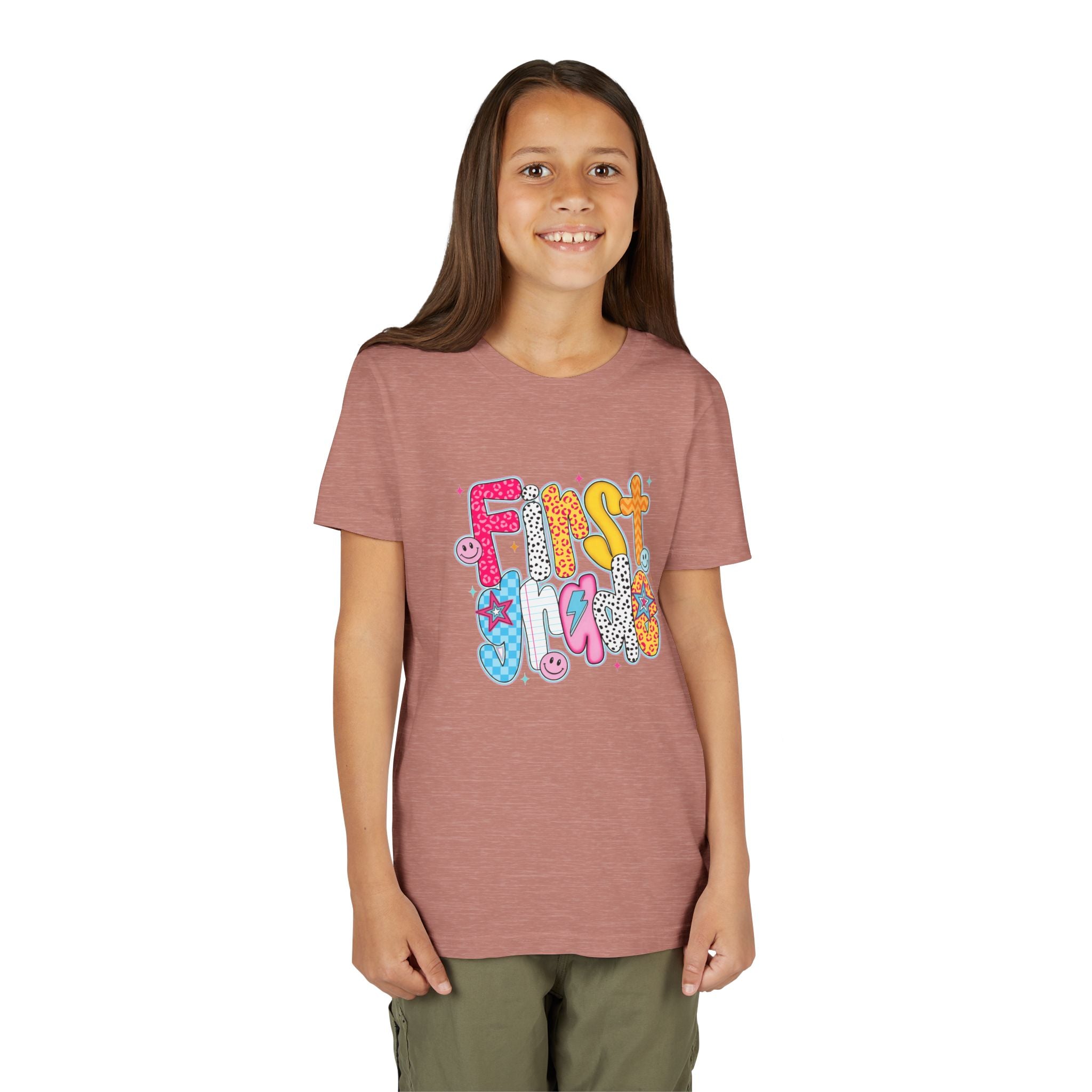First Grade Youth Tee — Colorful Back-to-School Graphic Shirt