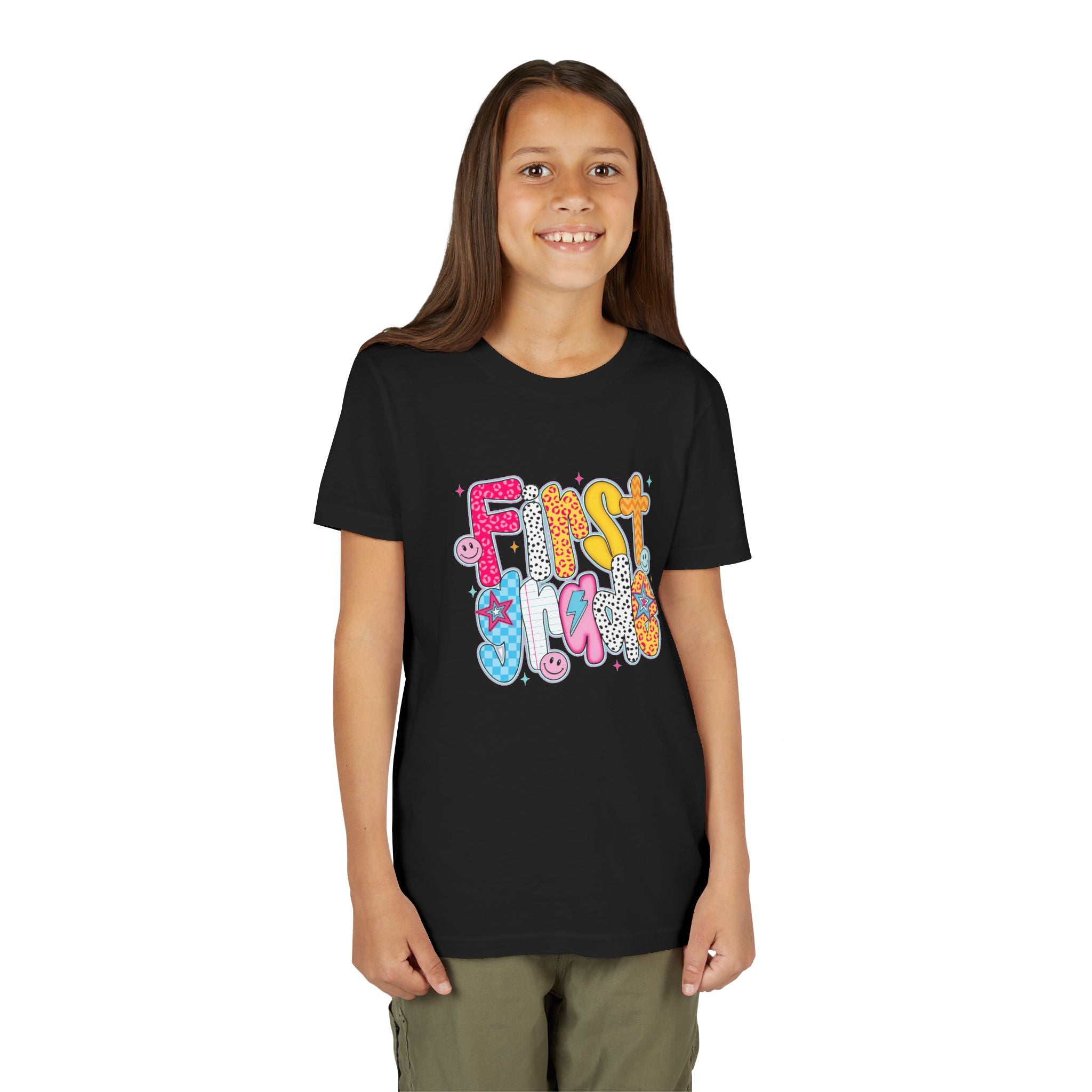First Grade Youth Tee — Colorful Back-to-School Graphic Shirt