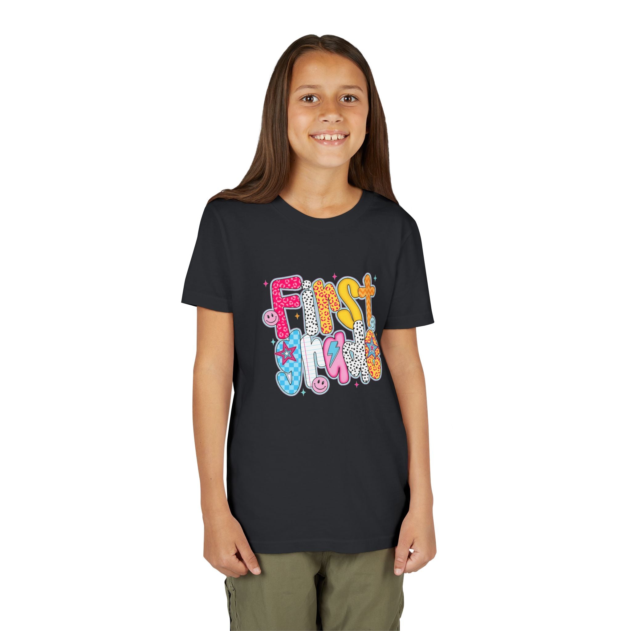 First Grade Youth Tee — Colorful Back-to-School Graphic Shirt