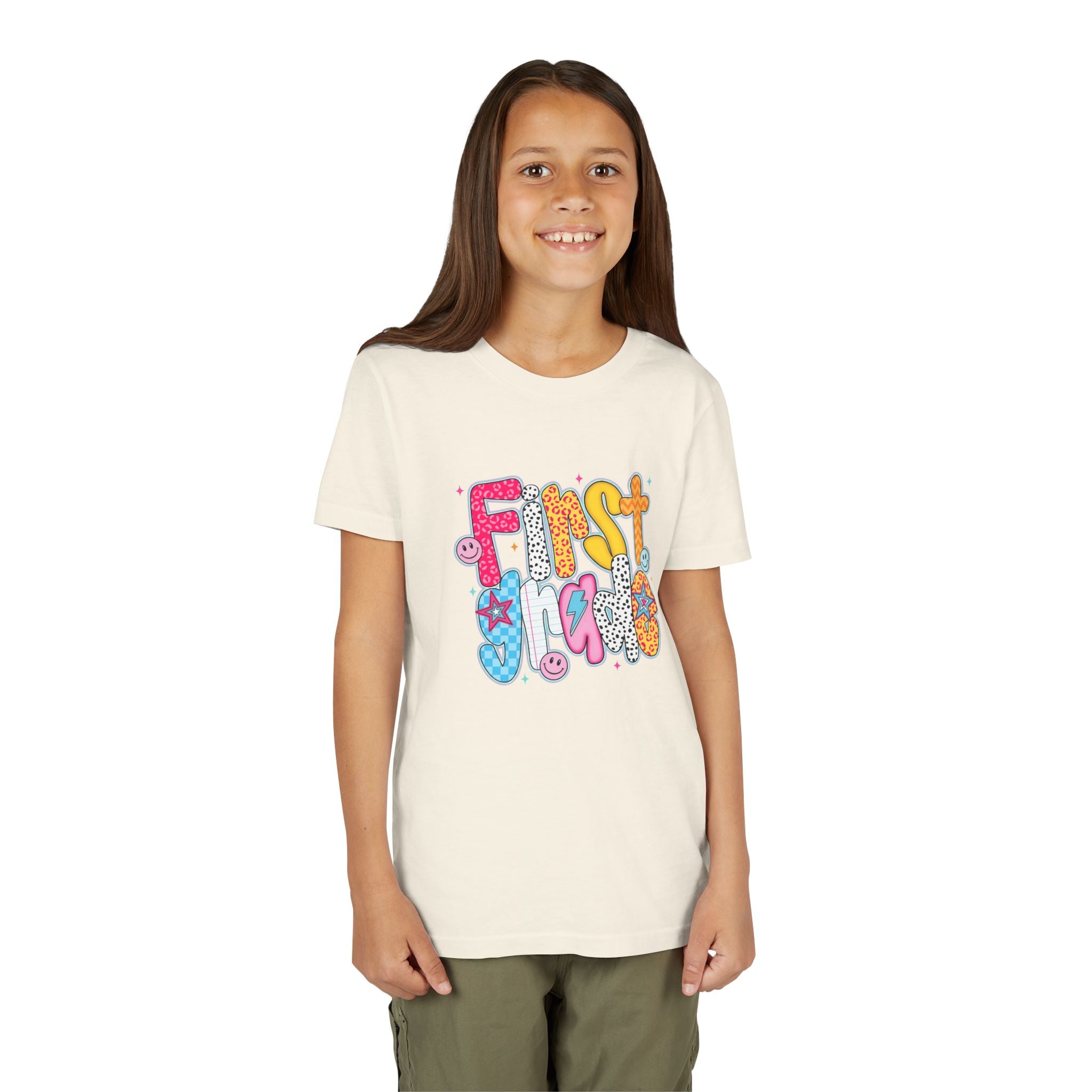First Grade Youth Tee — Colorful Back-to-School Graphic Shirt